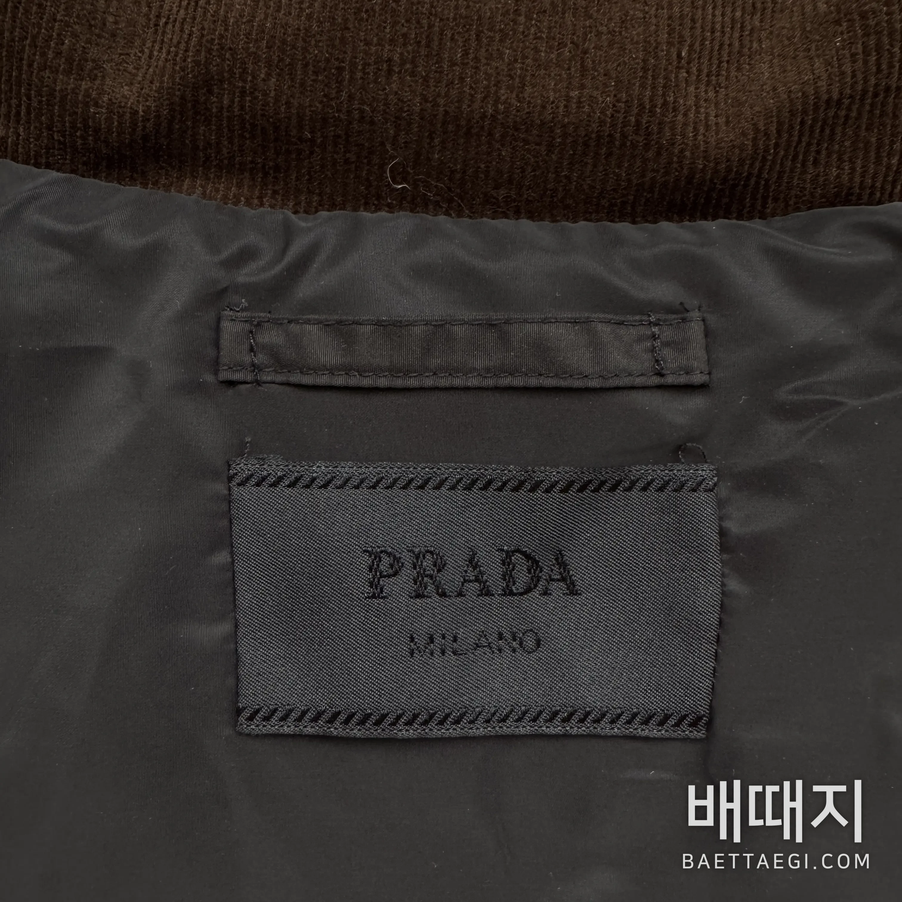 프라다 메탈 로고 남성 나일론 패딩 재킷 164990 검수사진 14