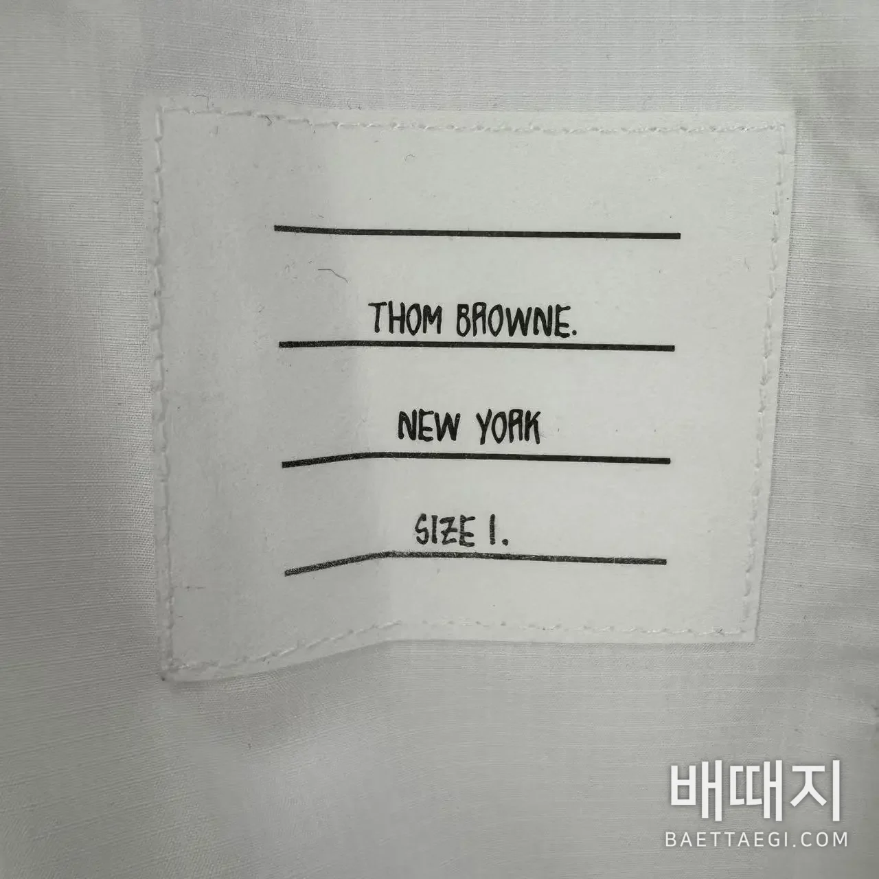 톰브라운 고밀도 체크 메시 4바 스트라이프 남성 자켓 검수사진 4