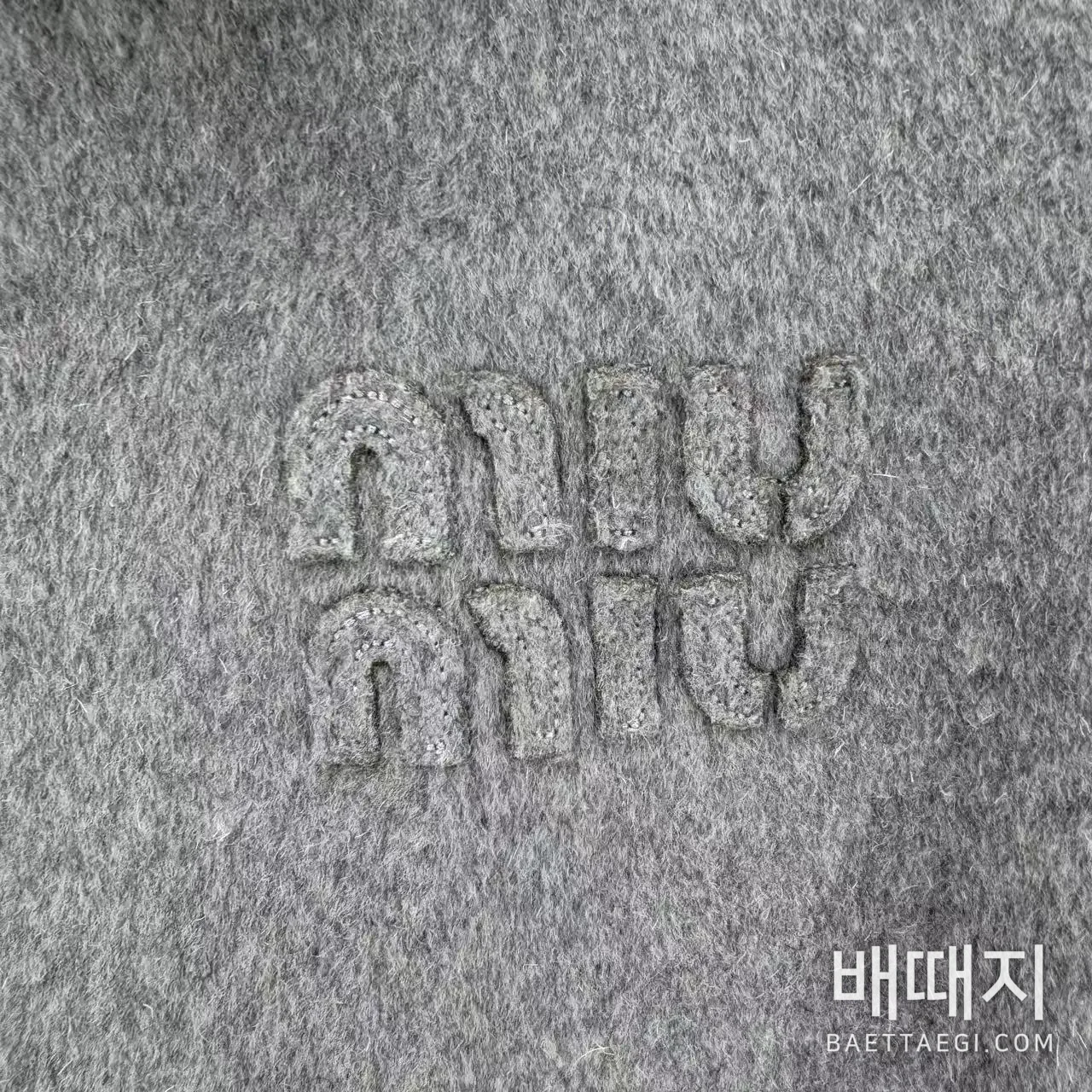 미우미우 카시미야 자수 로고 지퍼업 자켓 검수사진 3
