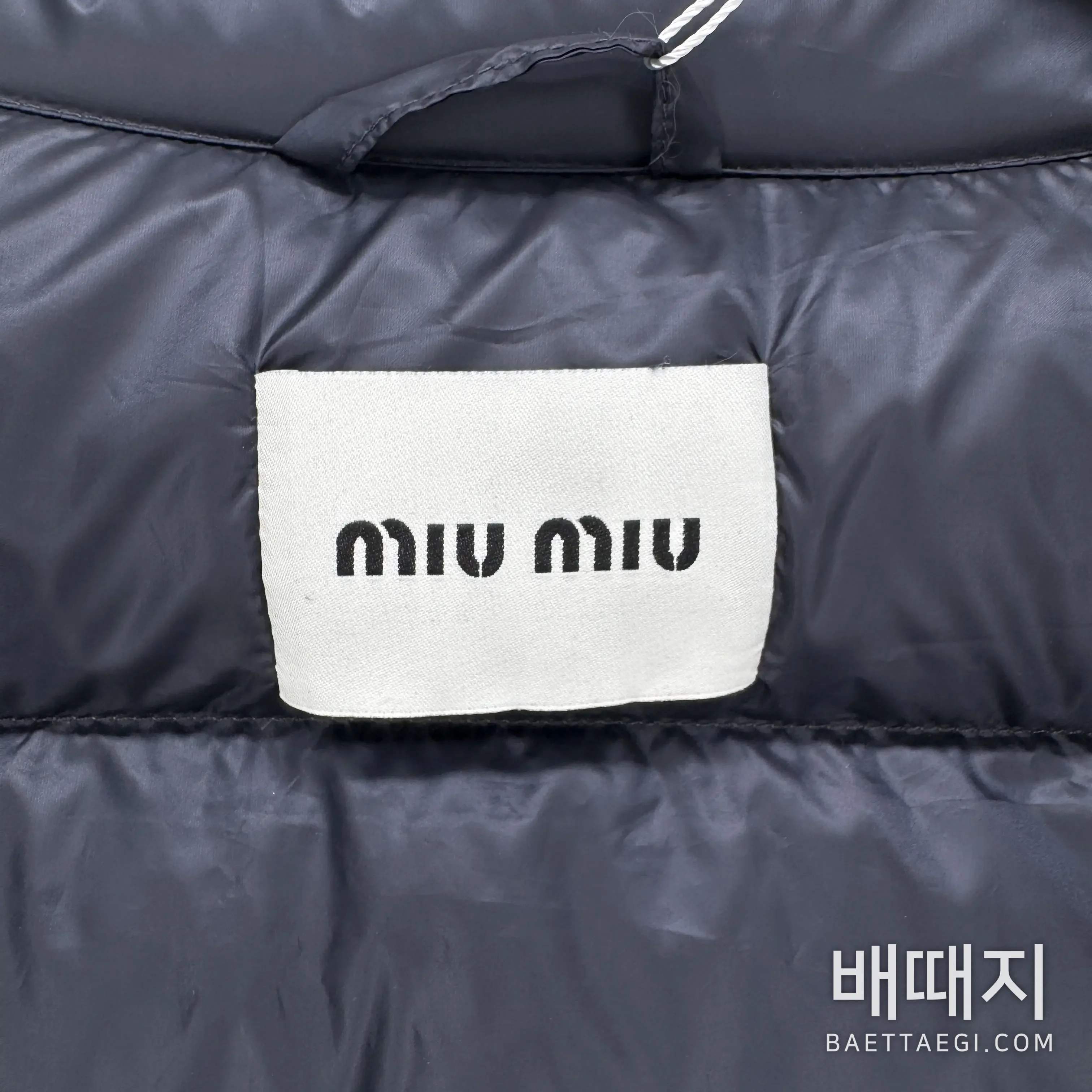 미우미우 로고 레터 다운 조끼 179702 검수사진 10