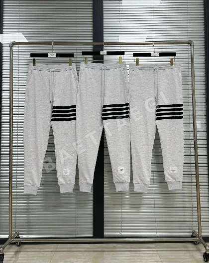 톰브라운 실염색 4바 스트라이프 면 바지