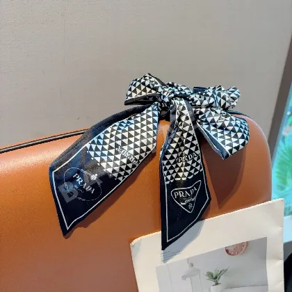 프라다 리본 나비넥타일 헤어고무 184236